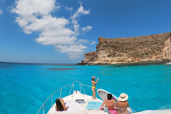 7 hours Boat trip to Lampedusa lunch, SUP and Snorkeling - Getting aboard: 10:00 start, 7 hours afloat, and a small crew vibe
