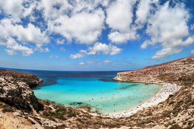 7 hours Boat trip to Lampedusa lunch, SUP and Snorkeling - Stop 1: The marine reserve beach view, plus a possible reach to the sand