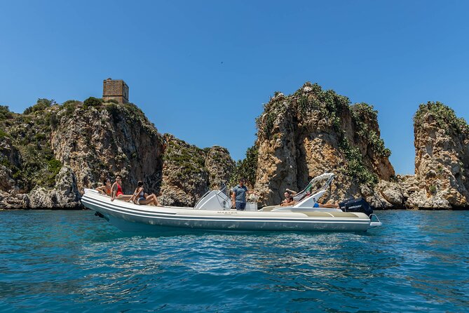 8-Hour Boat Tour from Castellammare del Golfo to San Vito Lo Capo - Cala Rossa and snorkeling over fish: what the second swim stop is really about