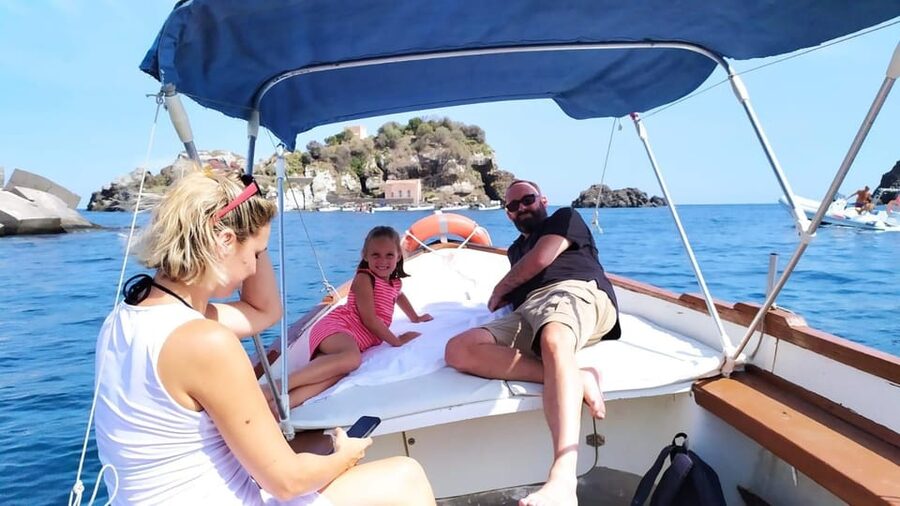 Aci Trezza boat tour sunset and dinner sicilian family home - Cyclops Coast at sunset, where myths and geology share the same view