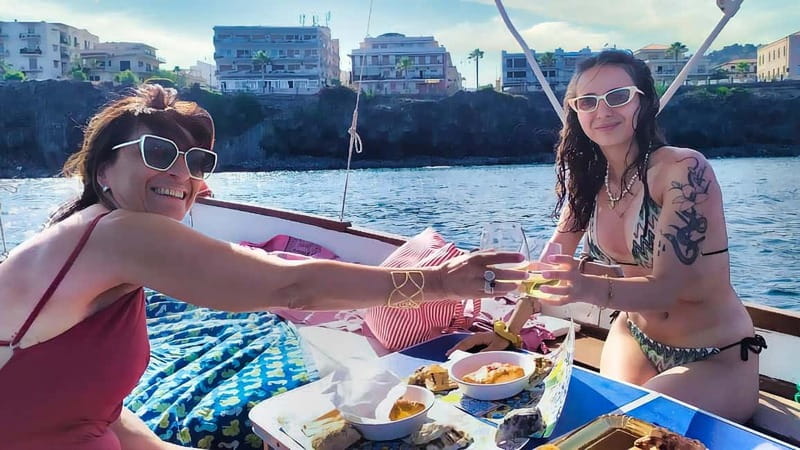 Aci Trezza: Cyclops Coast Boat Tour with Food and Swimming - Faraglioni, Polyphemus, and a Coast Shaped by Volcano Time