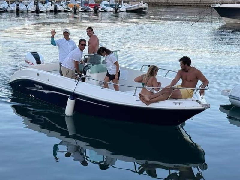 Aperitif on a boat at sunset at the Queen Cave - Why the Grotta della Regina sunset feels special from a boat