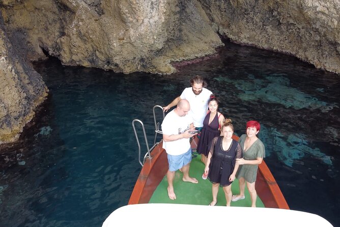 Boat excursion Taormina Giardini Naxos - Your route: bay views, grotto passages, and rock formations