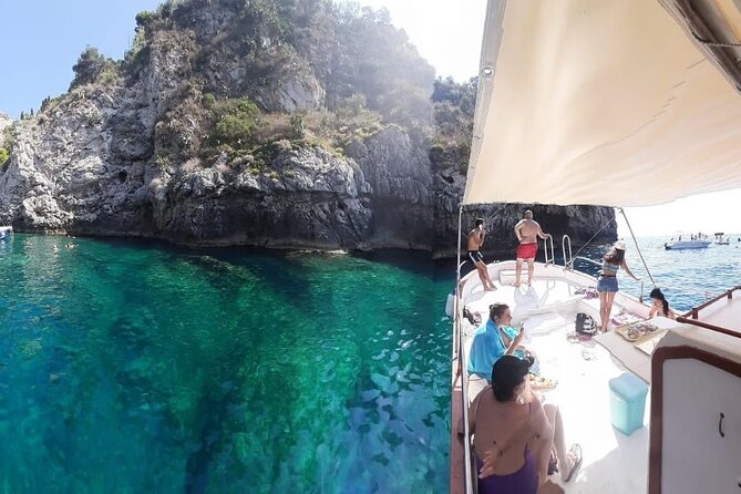 Boat tour Giardini Naxos Taormina Isola Bella Blue Grotto - Taormina and Mazzarò beach, seen from the water