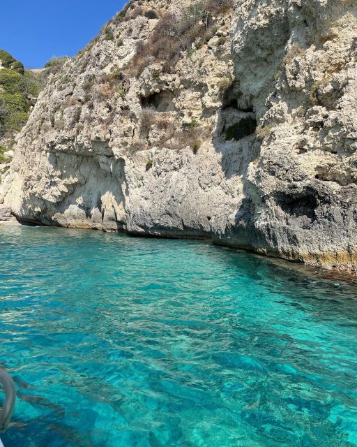 BOAT TOUR WITH APERITIF ON BOARD IN THE CYCLOPS ISLANDS - Lachea Island: volcanic rocks and the protected reserve vibe