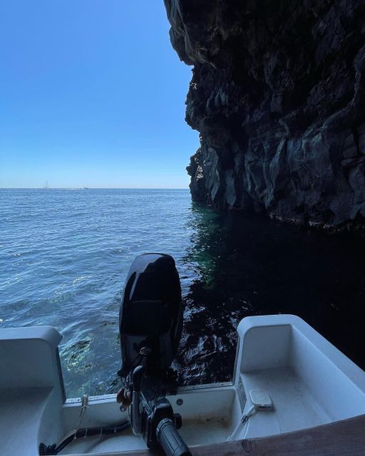 BOAT TOUR WITH APERITIF ON BOARD IN THE CYCLOPS ISLANDS - Your guide and audio: Italian and English, plus extra language support