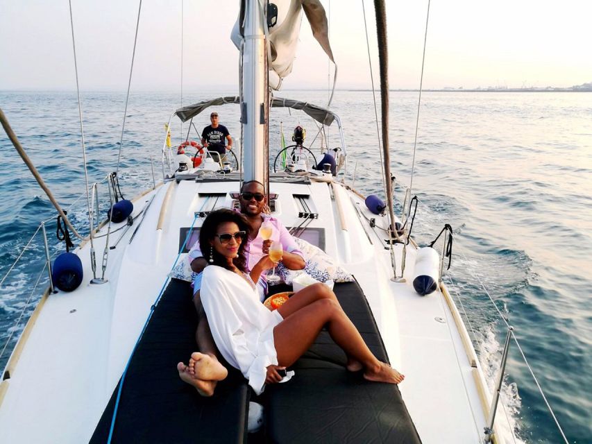 Catania: Coastline Sailing Trip 6hr with Aperitif and Lunch - Sailing the coast with teamwork, wind, and quick lessons