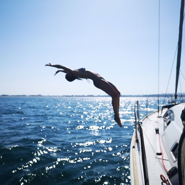 Catania: Coastline Sailing Trip 6hr with Aperitif and Lunch - Swimming in crystal-clear water, and what to bring