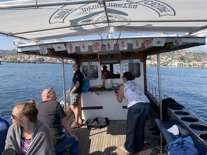 Catania: Cyclops Islands & Timpa Nature Reserve Boat Tour - The 13-Meter Boat Ride: Snacks, Calm Pace, and Easy Finding the Spots