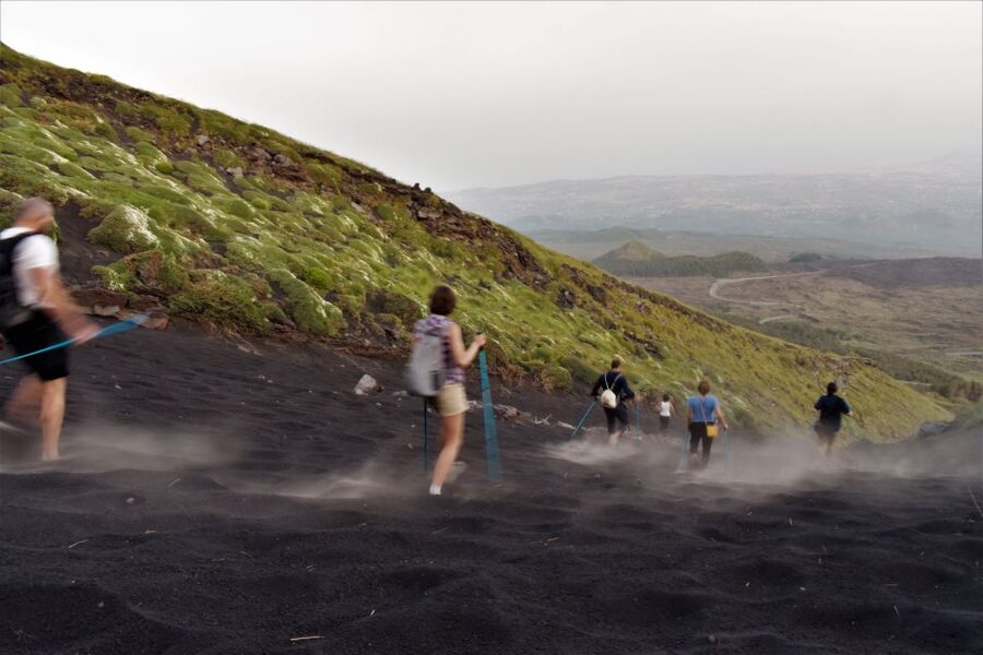 Catania: Etna Morning or Sunset Trek with Lava Tunnel & Gear - Van rides and pacing: how the day feels in real life