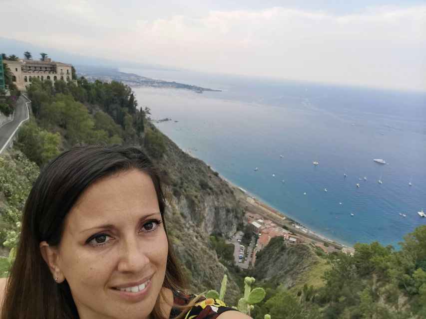 Catania: Giardini, Taormina, and Castelmola Day Trip - Stop 1: Giardini Naxos Bay and the feeling of the first Greeks