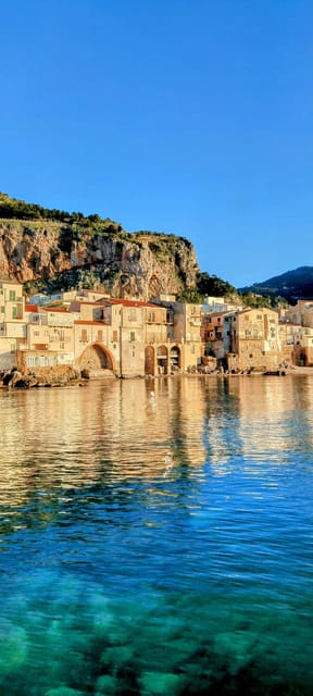 Cefalù: Mini Yacht with Snorkel Stops, Caves and Aperitif - Spiaggia di Cefalù: Your First Sea-Facing Look at the Town