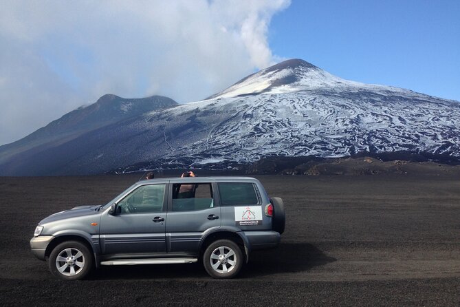 Etna Tour in 4x4 - Stop 1 on Etna: Lava Flows, Valleys, Side Craters, and a Cave With Lights