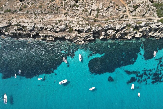 Favignana and Levanzo, Egadi islands tour by boat from Trapani - Stop 1: Scogliera Cala Azzurra and the Blue-Water First Impression