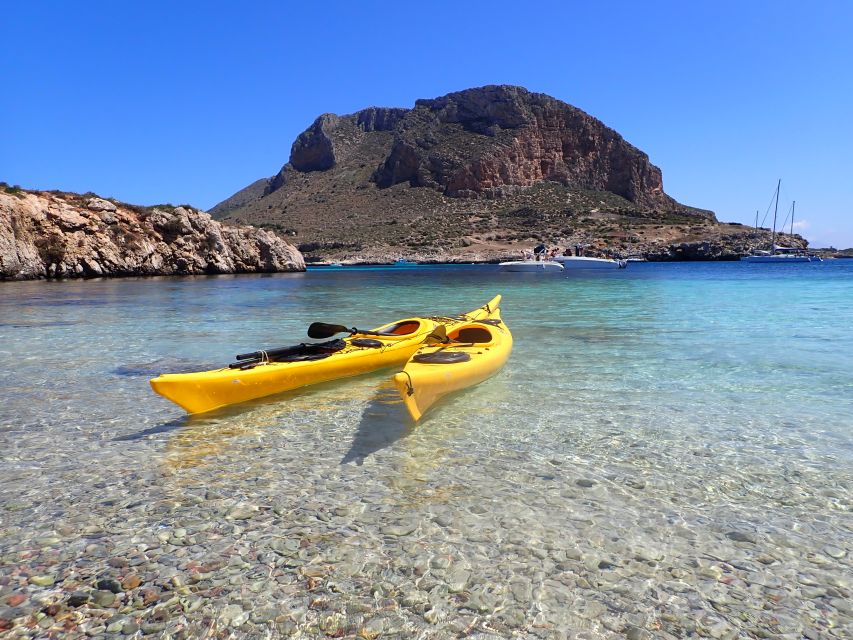 Favignana: kayak excursion, snorkelling and adventure - Snorkeling in clear water, with the guide keeping it practical