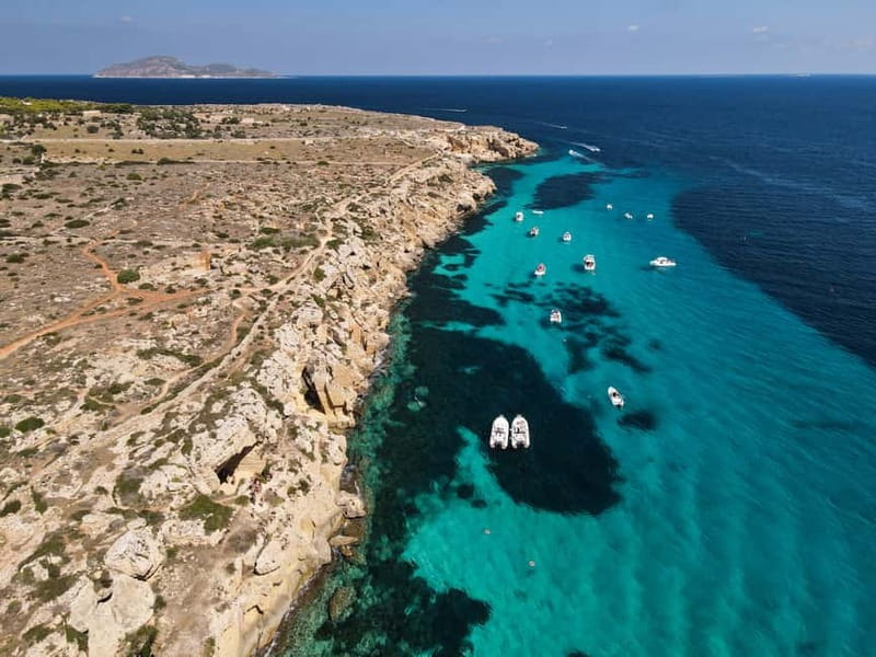 From Trapani: Egadi Islands Favignana & Levanzo Cruise - Levanzo viewpoints and Cala Fredda: sea stacks, then a pebble beach swim