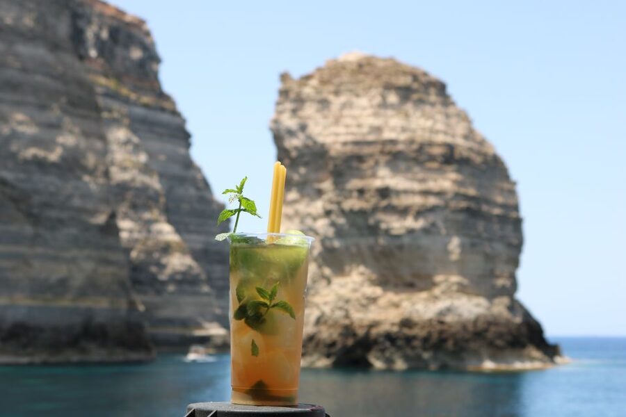 Lampedusa: Pirate Ship Boat Tour with Lunch and Music - Scoglio del Sacramento and the sea caves near Faraglione