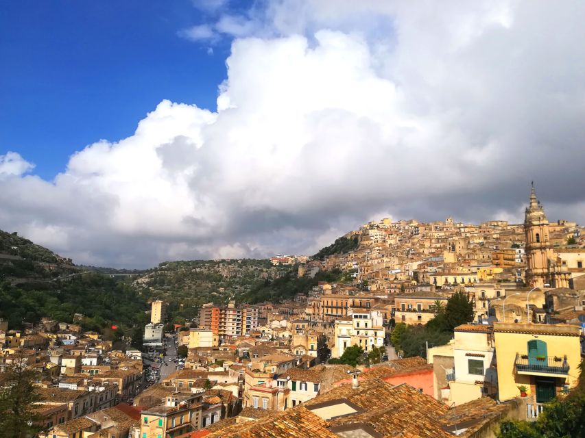 Modica private tour: the chocolate town in Sicily - Castle of the Counts Remains: A Medieval Rock Seat with a Clock Tower
