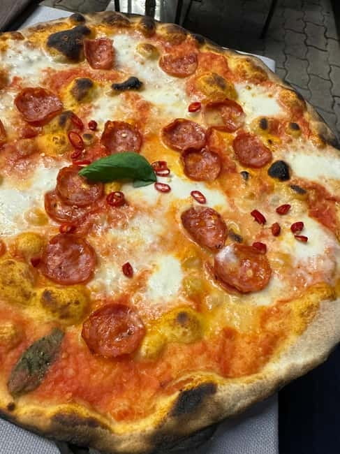 Palermo: Pizza & Tiramisu Class with Free Flowing Fine Wine - Shaping, topping, and avoiding the usual dough mistakes