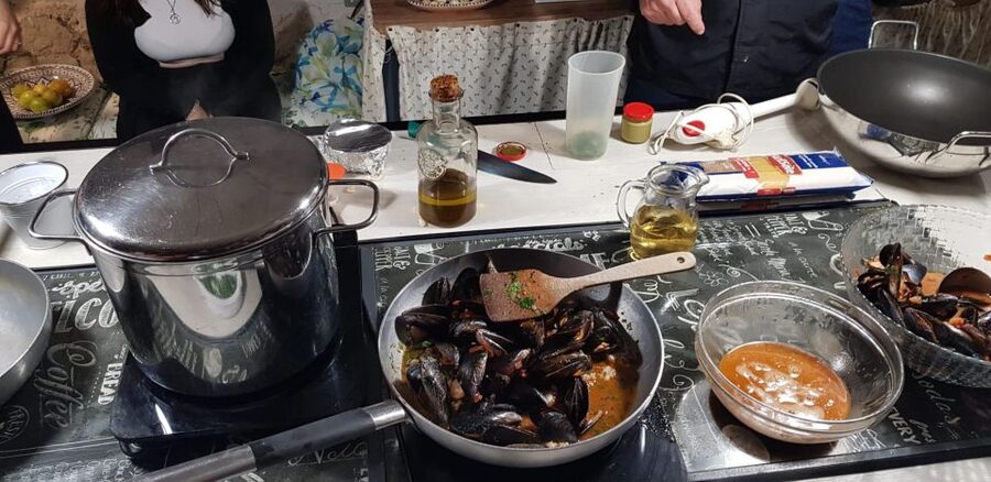 Palermo: Sicilian Cuisine Social Cooking Class & Dinner - Outdoor kitchen atmosphere, family table energy