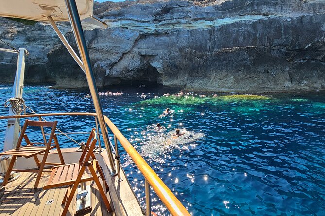 SciatumiaDay boat tour to Lampedusa with typical lunch - The Long First Stretch Around Isola dei Conigli