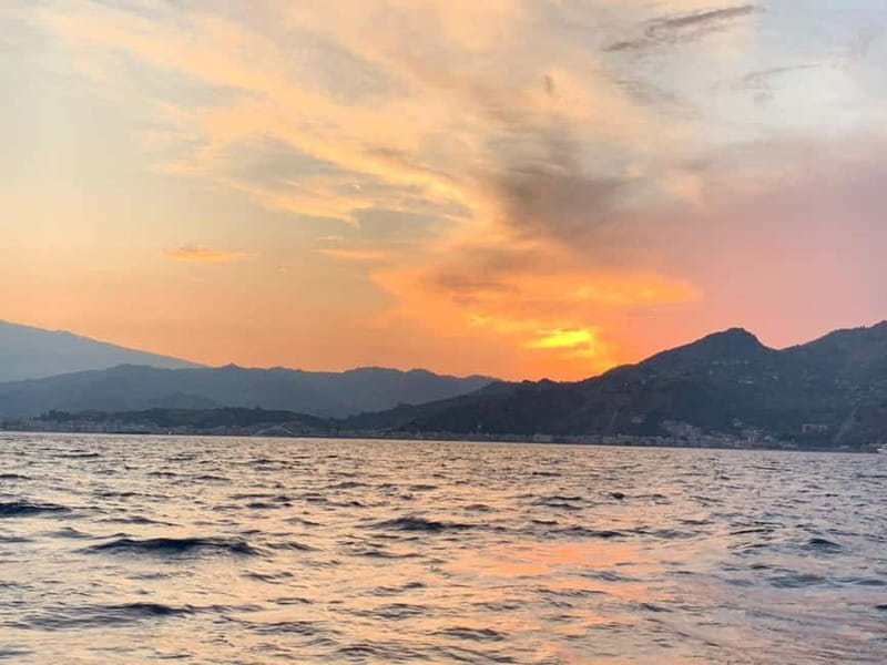 Sunset tour in search of dolphins with aperitif - Aperitivo vibes, onboard music, and why the hosts matter
