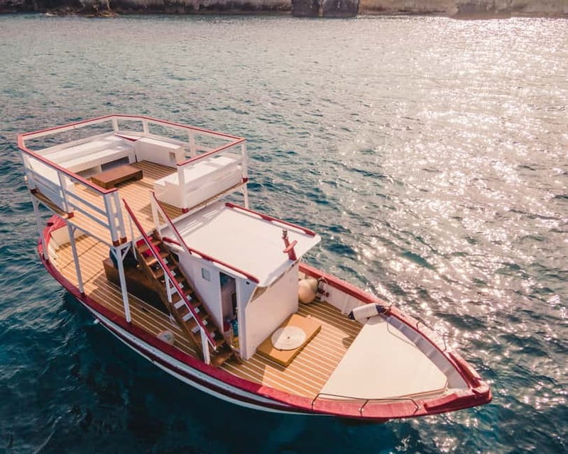 Syracuse: Boat Trip with Lunch, Wine, and Swimming Stops - Ortigia island highlights: Bourbon prison, fort walls, Maniace castle, and more
