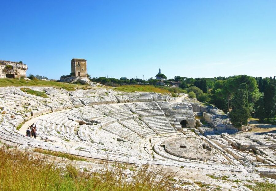 Syracuse: Neapolis Archaeological Park Small Group Tour - Latomie del Paradiso quarry walk: plants in ancient rock