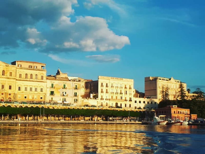 Syracuse: Ortigia and Neapolis Guided Walking Tour - Stop 3: Neapolis archaeological park, theaters, Latomia, and the Ear of Dionysos