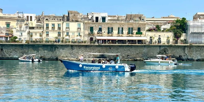 Syracuse: Ortigia Island and Sea Caves Boat Tour with Drinks - The sea caves near Syracuse side, including the heart-shaped cave