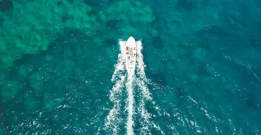 Syracuse: Pillirina, Ortigia, and Sea Caves Tour by Boat - A live guide in the mix, with music on board