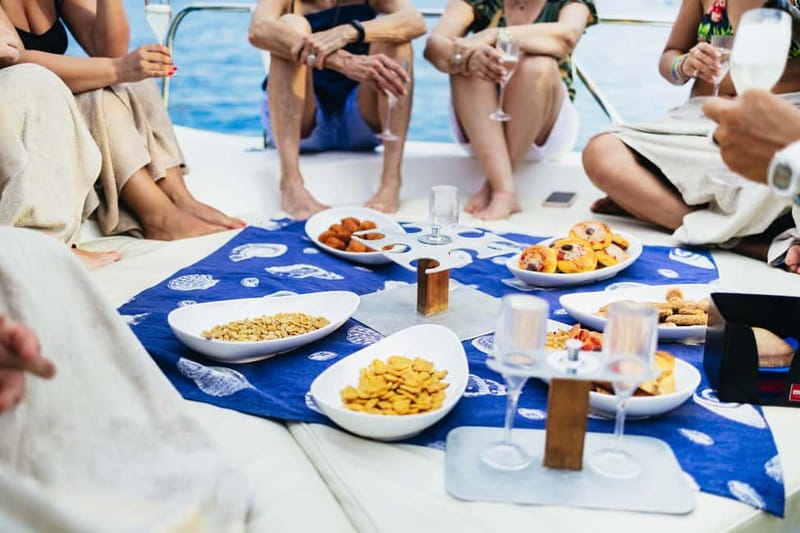 Taormina: Sunset Boat Tour with Dolphin Watching & Aperitif - Aperitif Style Snacks and Drinks, Plus a Real Social Feel