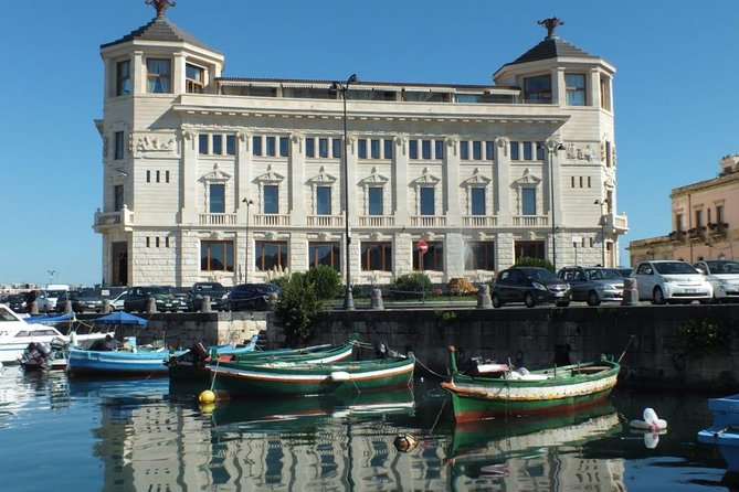 Tour of the island of Ortigia and exploration of sea caves with baths. - The swim stop: how to plan for jumping in and staying comfortable